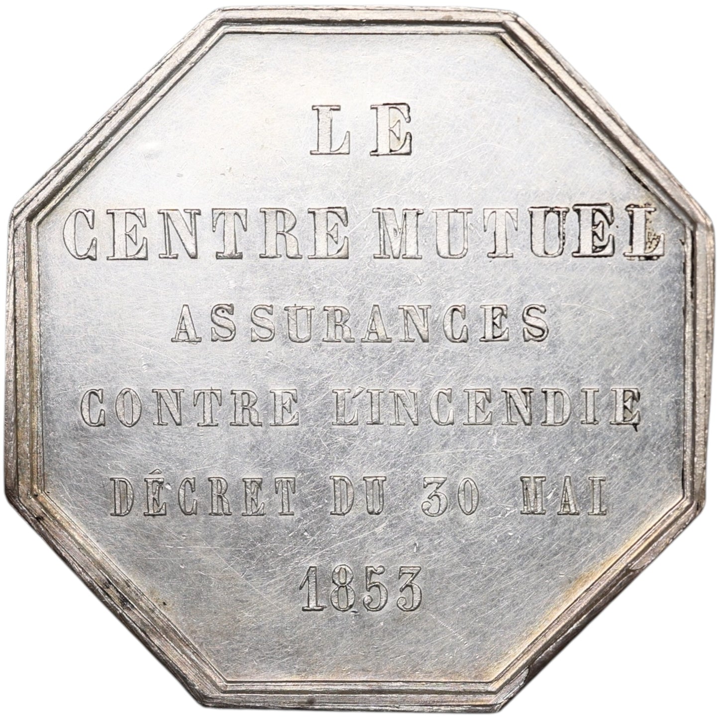 Ficha de seguro El centro mutuo contra el fuego 30 de mayo de 1853 Plata 19.09gr 36mm