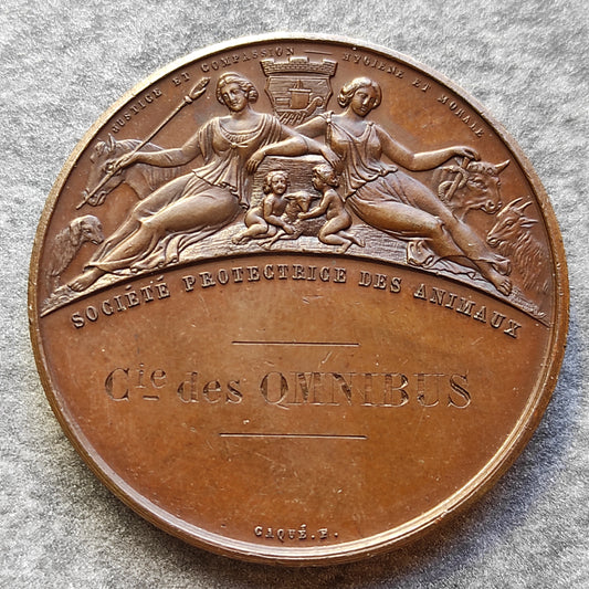 Médaille Société Protectrice des Animaux Compagnie des Omnibus Cocher 1877. Cuivre 35.4 gr 41 mm
